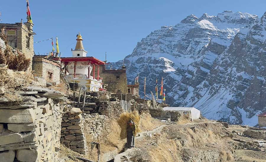 view of himalaya and gompa from nar phu valley trek nepal